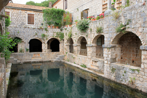 lovely ancient pond in the Fortress of Petar Hektorović, Stari Grad on the island Hvar, Croatia 