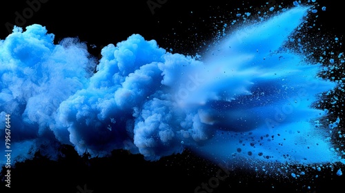  A black background with a blue cloud of smoke