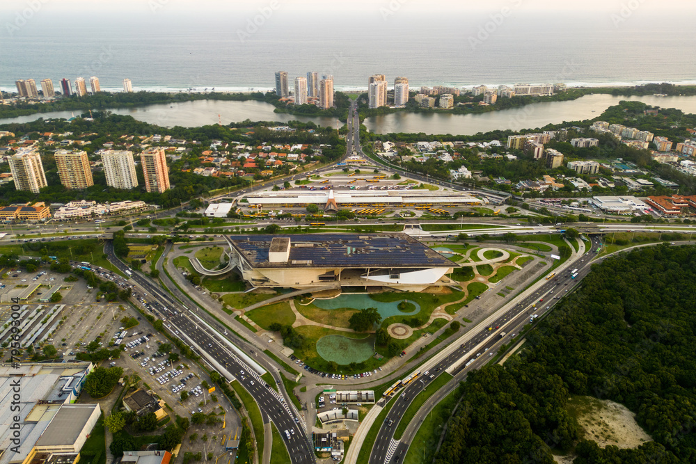 Fototapeta premium Aerial View of Barra da Tijuca District With Alvorada Bus Terminal, Cidade das Artes Cultural Complex and Ocean in the Horizon in Rio de Janeiro