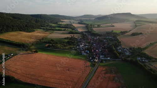 Drone aerial flight over small village and houses in Germany, Thuringia. photo