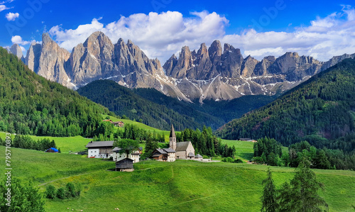 Stunning Alpine scenery of breathtaking Dolomites rocks mountains in Italian Alps, South Tyrol Alto adige , Italy.  Val di Funes and village Santa Maddalena. photo