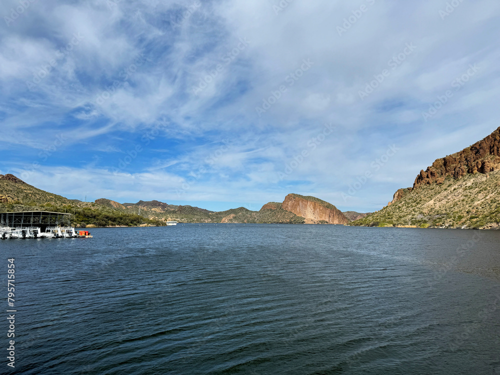 View from a steamboat, of Canyon Lake reservoir, harbor and rock formations in Maricopa County, Arizona in the Superstition Wilderness of Tonto National Forest near Apache Trail.  The lake was formed 