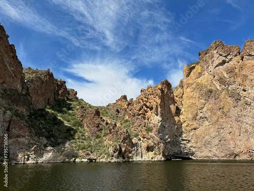 View from a steamboat, of Canyon Lake reservoir and rock formations in Maricopa County, Arizona in the Superstition Wilderness of Tonto National Forest near Apache Trail. The lake was formed by dammi