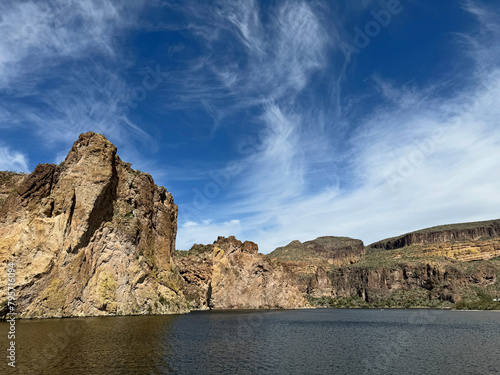 View from a steamboat, of Canyon Lake reservoir and rock formations in Maricopa County, Arizona in the Superstition Wilderness of Tonto National Forest near Apache Trail.  The lake was formed by dammi