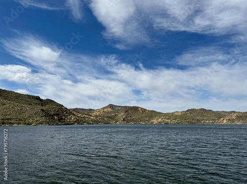 View from a steamboat, of Canyon Lake reservoir and rock formations in Maricopa County, Arizona in the Superstition Wilderness of Tonto National Forest near Apache Trail.  The lake was formed by dammi photo