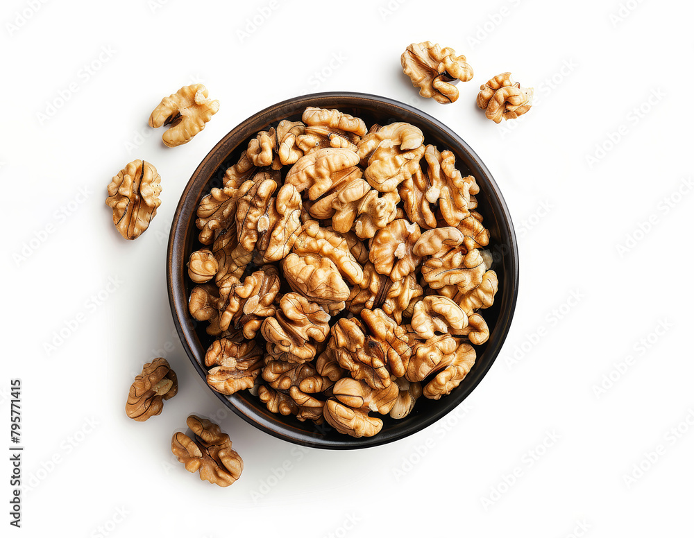 Bowl of walnuts isolated isolated on white background., top view. Bowl of walnuts isolated isolated on white background., top view.