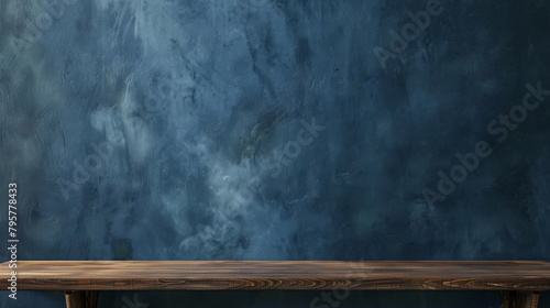Simple wooden shelf against a dark blue plaster wall, perfect for showcasing products © Michael