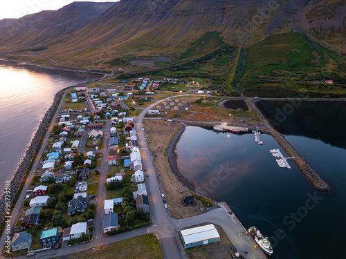 Evening aerial shot of town of Flateyri in the Westfjords of Iceland photo