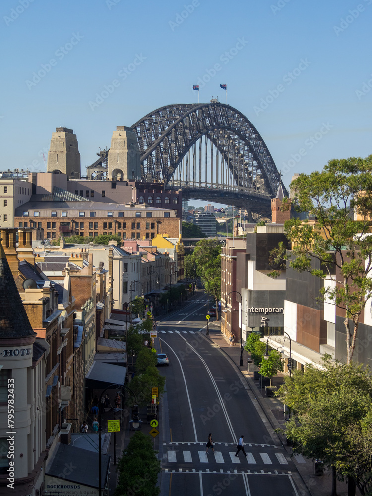 Sydney Harbour Bridge seen over the city streets