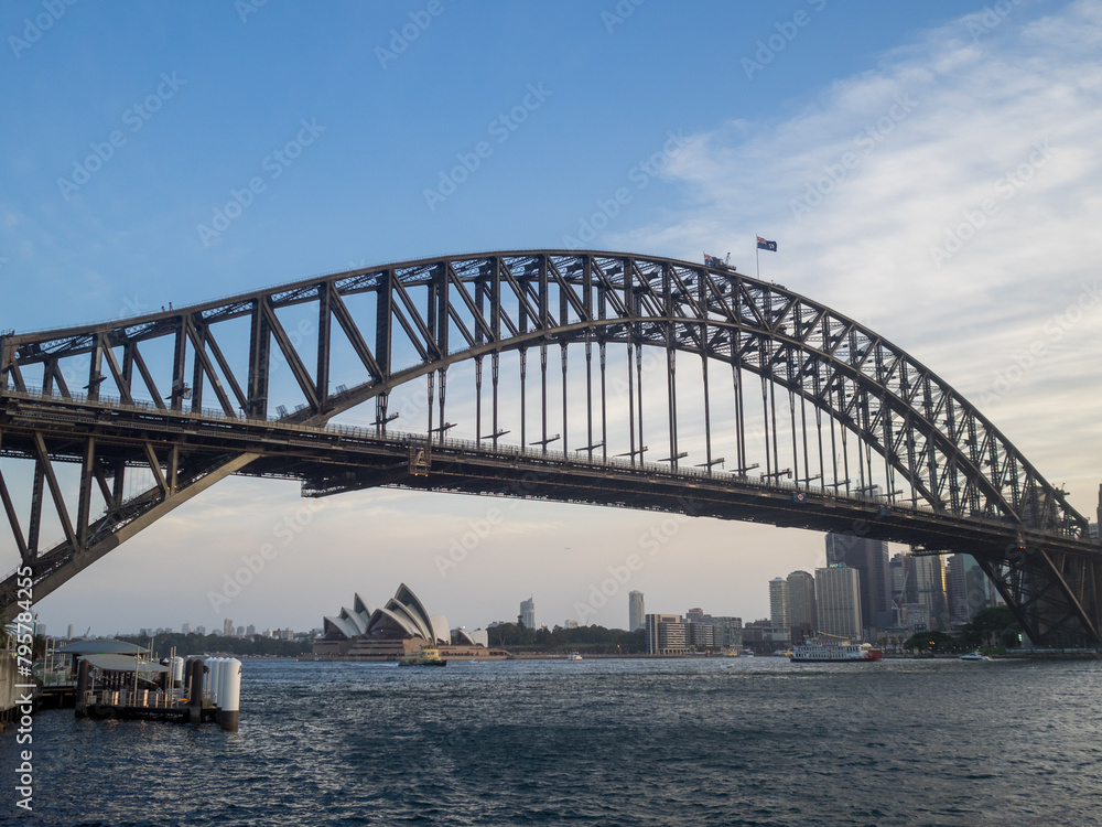 Sydney Harbour Bridge and the cityscape below seen from Milsons Point