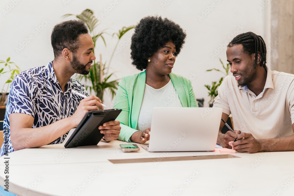 Diverse Team Collaborating in Modern Coworking Space
