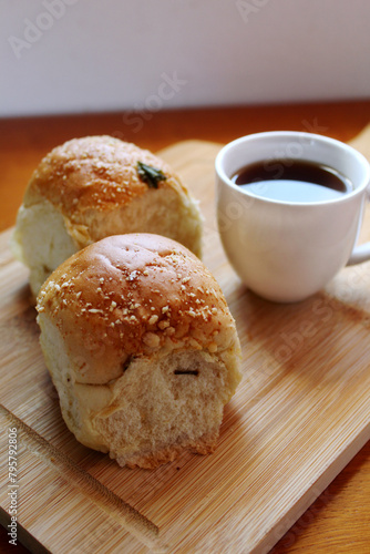 Brazilian breakfast wth coffee cup and homemade breads.