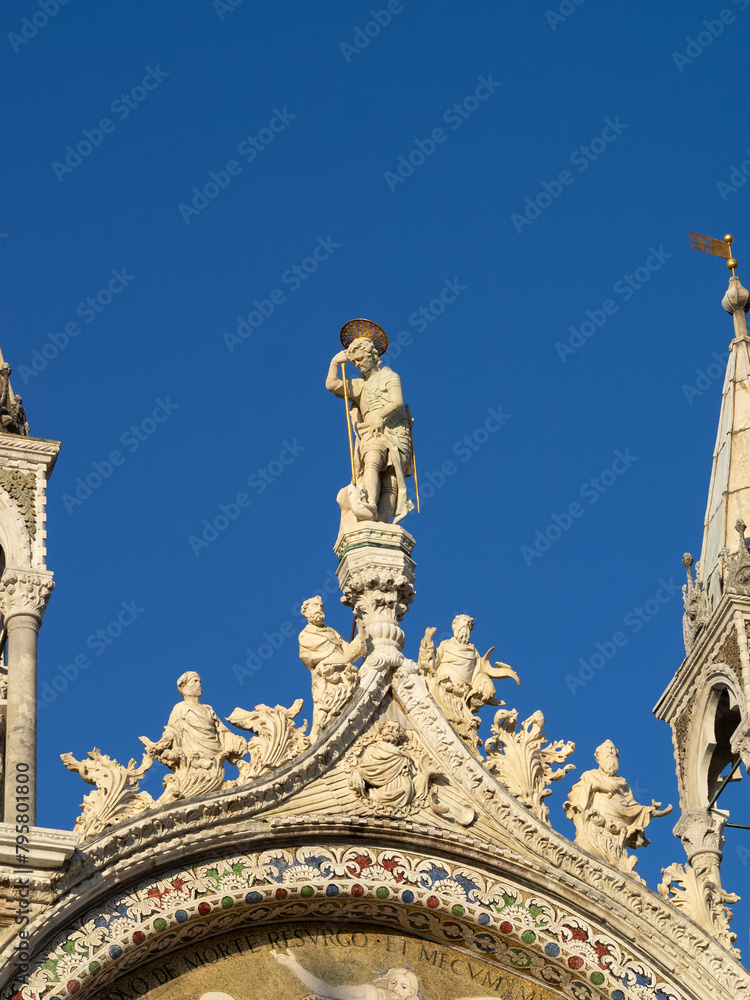 Statue of a Saint atop the facade of San Marco Basilica, Venice