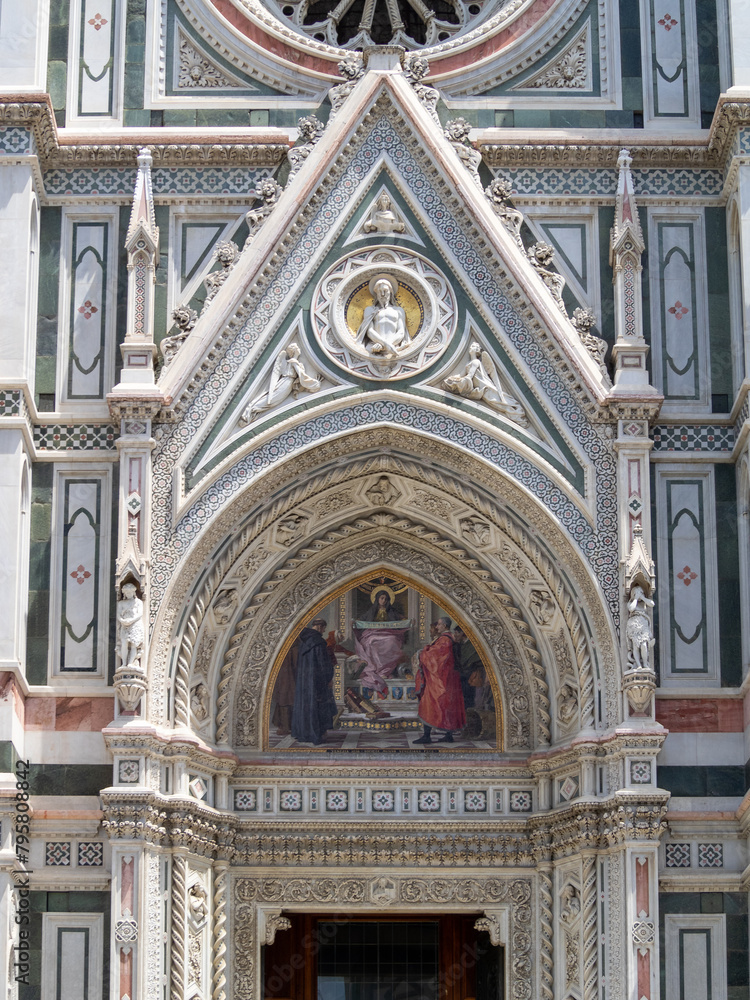 Florence Duomo left portal detail with mosaic of  “Charity among the Founders of Florentine Philanthropic Foundations” by Niccolo Barabino