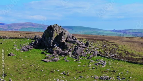 High aerial circling the peak of Dinas Mountain in Pembrokeshire, Wales photo