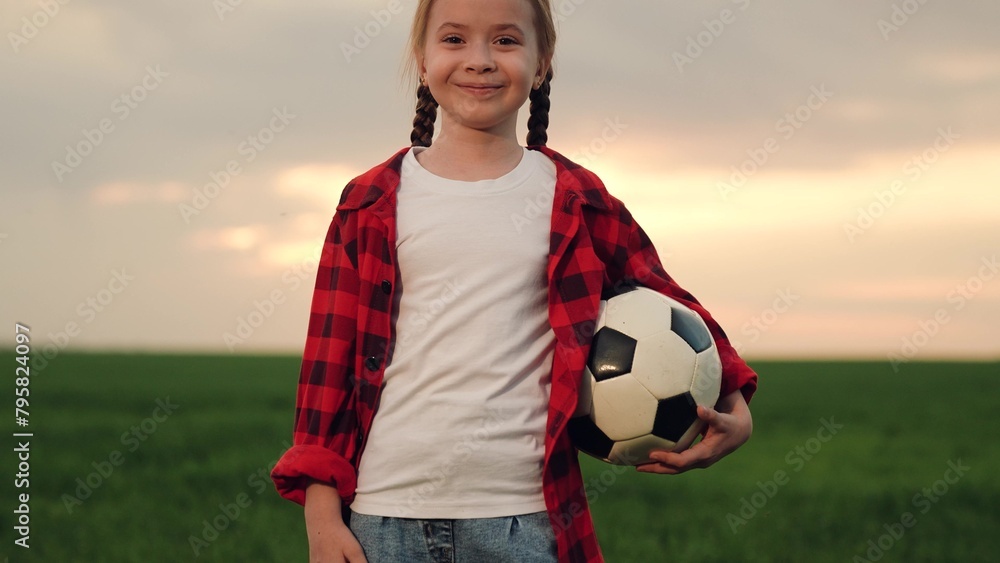 little girl schoolgirl with soccer ball, happy face child kid smile