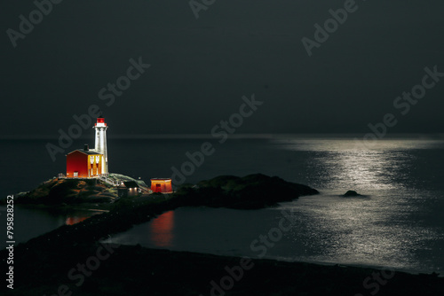 Lighthouse on the coast photo