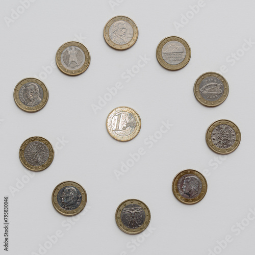 One euro coins on white background