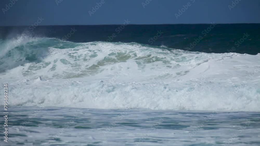 Panning shot over epic, foaming waves Panning shot over epic, foaming waves