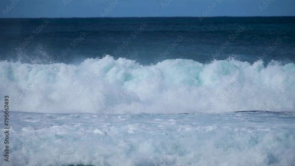 Bright, beautiful ocean wave crashing and creating foam Bright, beautiful ocean wave crashing and creating foam