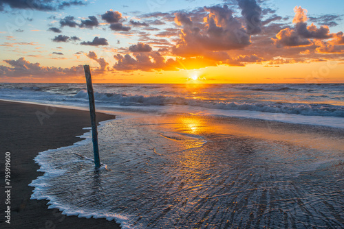 Sea sand beach. Panoramic beach landscape. Inspire tropical beach seascape horizon. Orange and golden sunset sky calmness tranquil relaxing sunlight summer mood. Vacation travel holiday banner, coast.