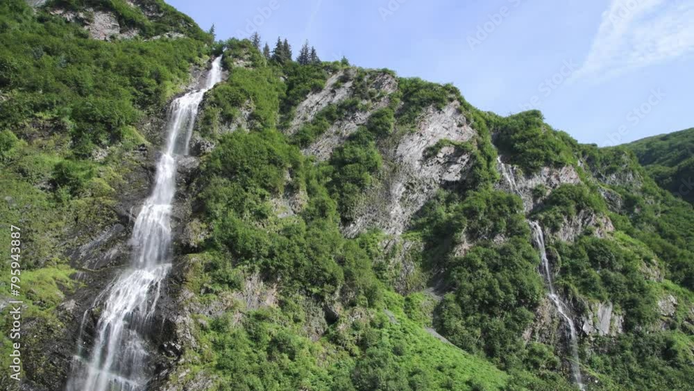 The cascading Bridal Veil Falls in Valdez, Alaska The cascading Bridal Veil Falls in Valdez, Alaska