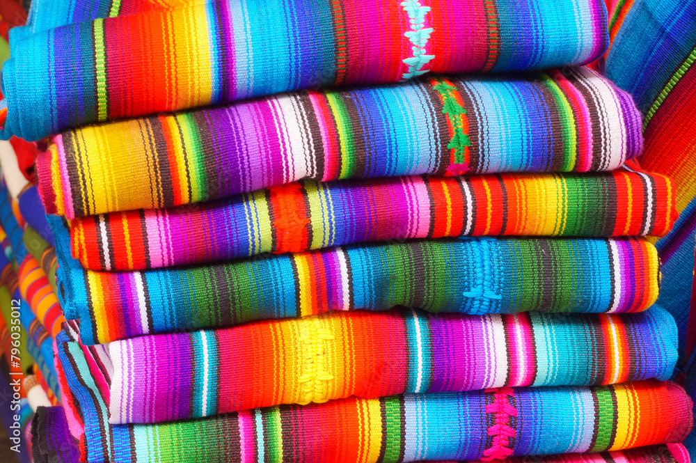 Brightly colored textiles in a market in South America