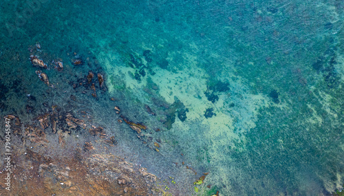 ocean and rocks from top view