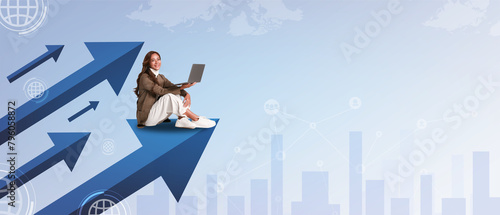 Young businesswoman with laptop sitting on arrow going up against light city background with copy space. Financial growth concept