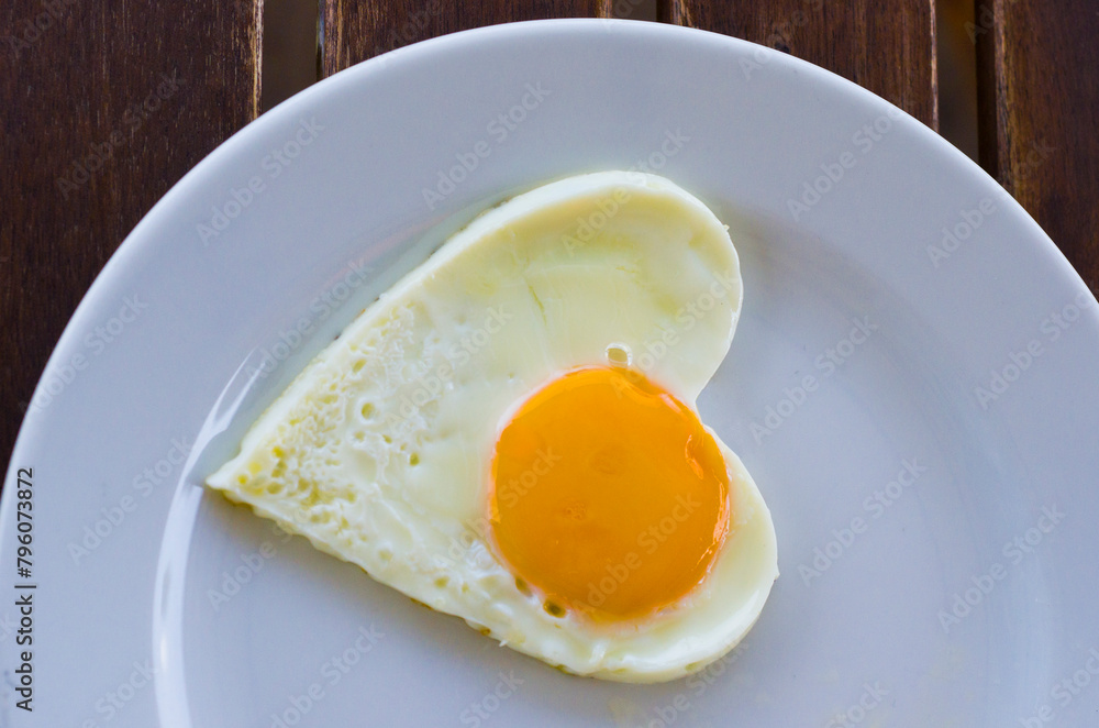 American Breakfast with Fried egg in ideal heart. American Breakfast with Fried egg in ideal heart.