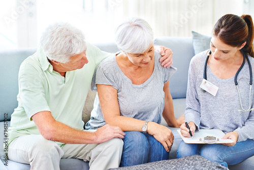 Senior, couple and doctor with results for woman in consultation with advice and support. Patient, report and nurse in elderly care with news, info or medical notes on hypertension or blood pressure photo