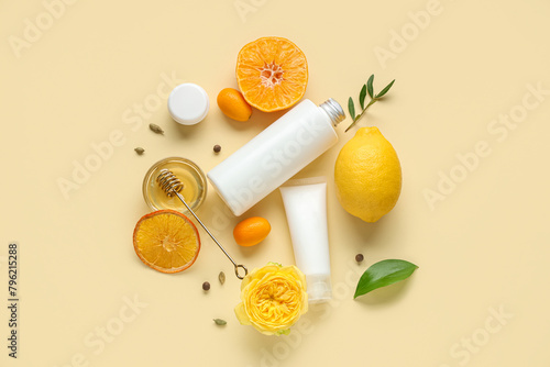 Set of natural cosmetic products, honey and lemon on yellow background