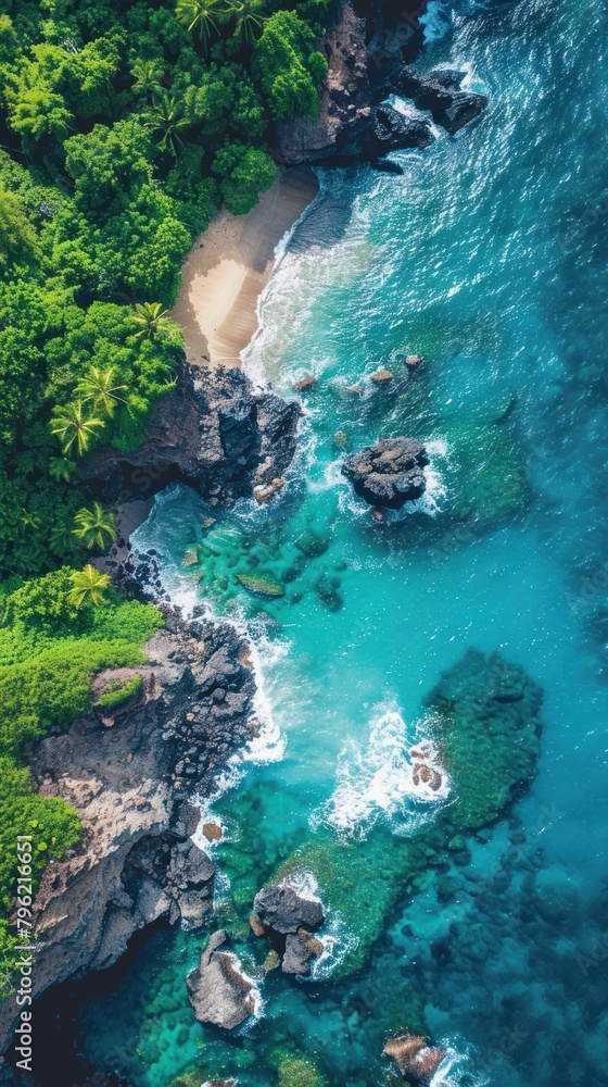 A top-down perspective of ocean waves crashing onto a sandy beach A top-down perspective of ocean waves crashing onto a sandy beach