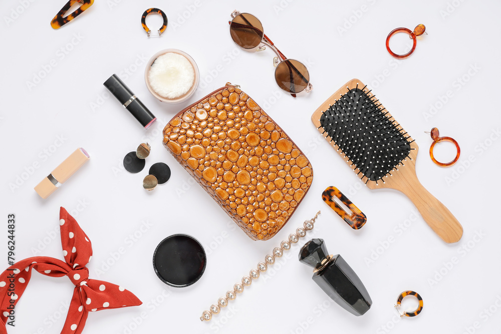 Bag, comb and woman accessories on white background