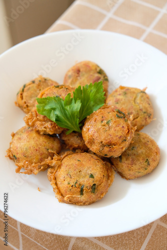 Perkedel kentang is an Indonesian fried patties made of mashed potatoes, minced meat, garlic, pepper and salt.