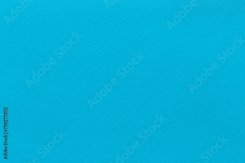 Turquoise color fabric texture as background.