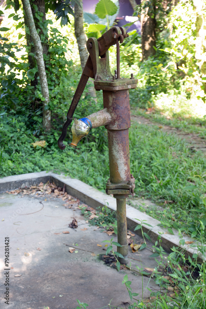 a tube well in a village in Bangladesh. fresh water in house. image for world water day concept.
