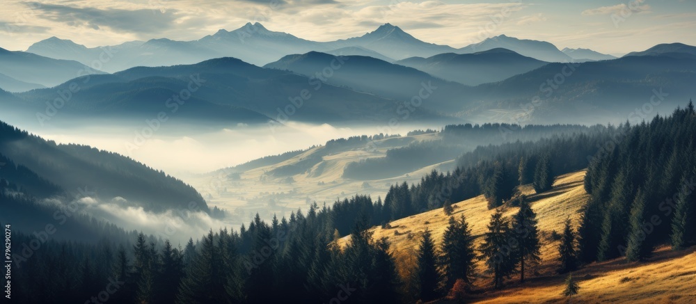 Obraz premium Majestic peaks shrouded in mist