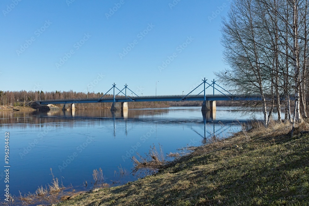 Bridge over river in spring.