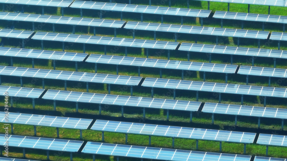 Solar photovoltaic facility utilizes photovoltaic cells to convert sunlight into electrical energy, contributing to sustainable power generation and reducing carbon emissions. Aerial view drone.
Solar photovoltaic facility utilizes photovoltaic cells to convert sunlight into electrical energy, contributing to sustainable power generation and reducing carbon emissions. Aerial view drone.
