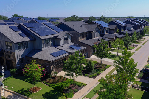 A suburban enclave with modern homes boasting roofs adorned with solar panels, showcasing a commitment to renewable energy and environmental stewardship.