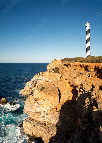 Punta Moscarter lighthouse near Portinatx, Sant Joan de Labritja, Ibiza, Balearic Islands, Spain photo