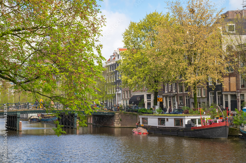 Calm canal in Amsterdam, Holland in the summer