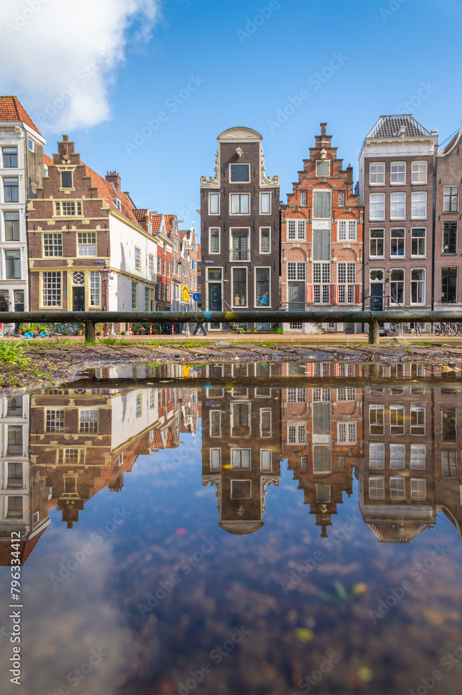 Dutch houses reflection on a sunny day