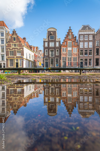 Dutch houses reflection on a sunny day photo