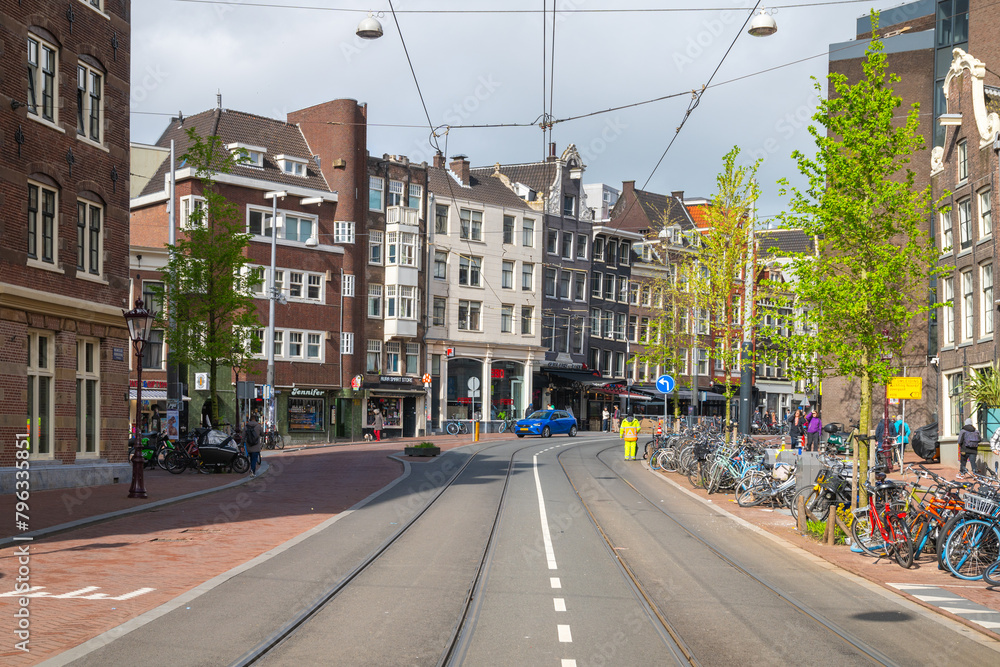 Fototapeta premium Urban road in Amsterdam, Netherlands