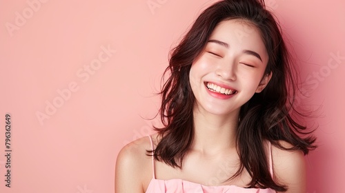 full length beauty photo of young Asian woman smile on pink background