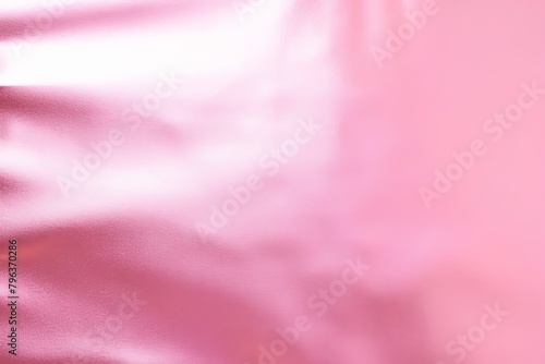 Pink foil metallic wall with glowing shiny light, abstract texture background blank empty with copy space