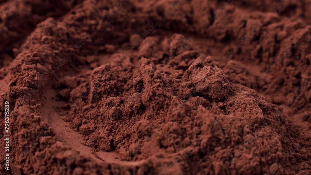 Brown cocoa powder texture circle rotation close up Brown cocoa powder texture circle rotation close up