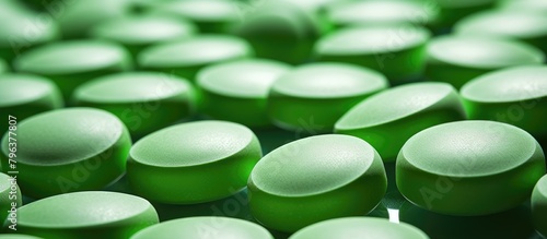 Close up of green pills on table